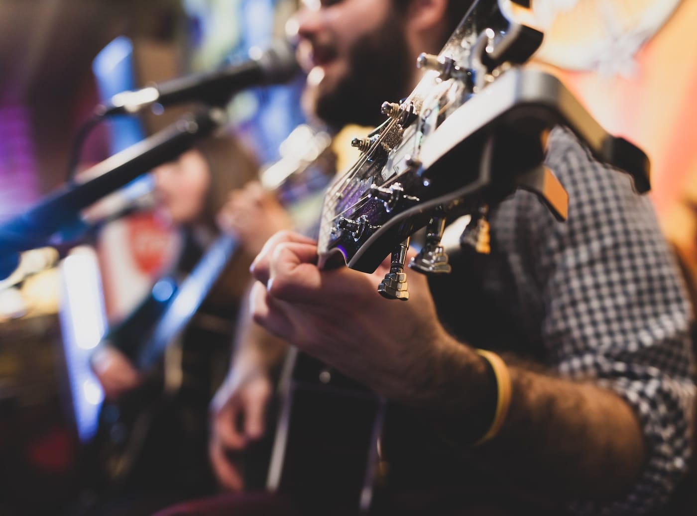 Playing classic guitar. Selective focus