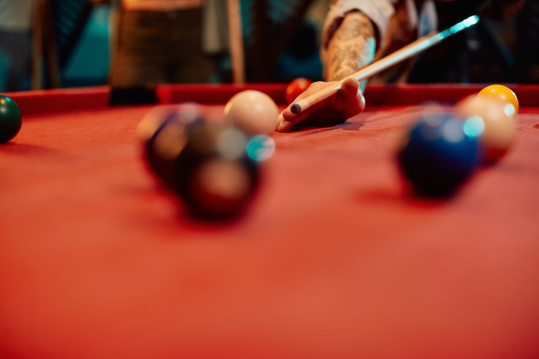 Close-up of man playing pool in a pub